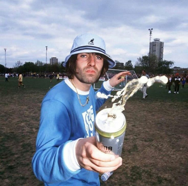 The 20 Greatest Photos Of Rockstars Drinking Beer Ever